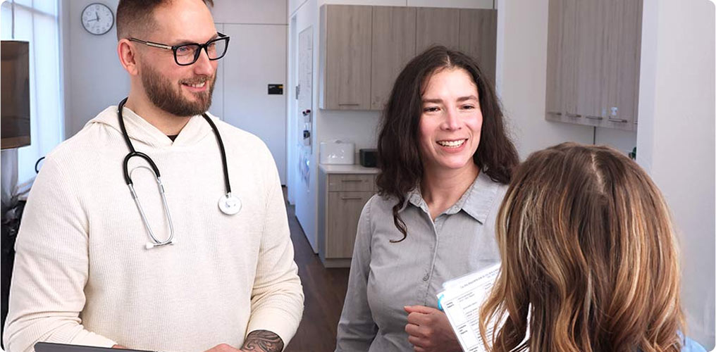 Patient visiting with VitellaCare providers