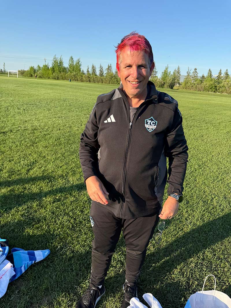 Jerry Wynne with pink hair at soccer game