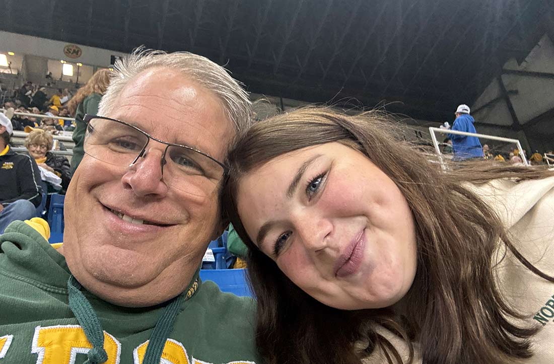 Jerry Wynne and daughter at football game